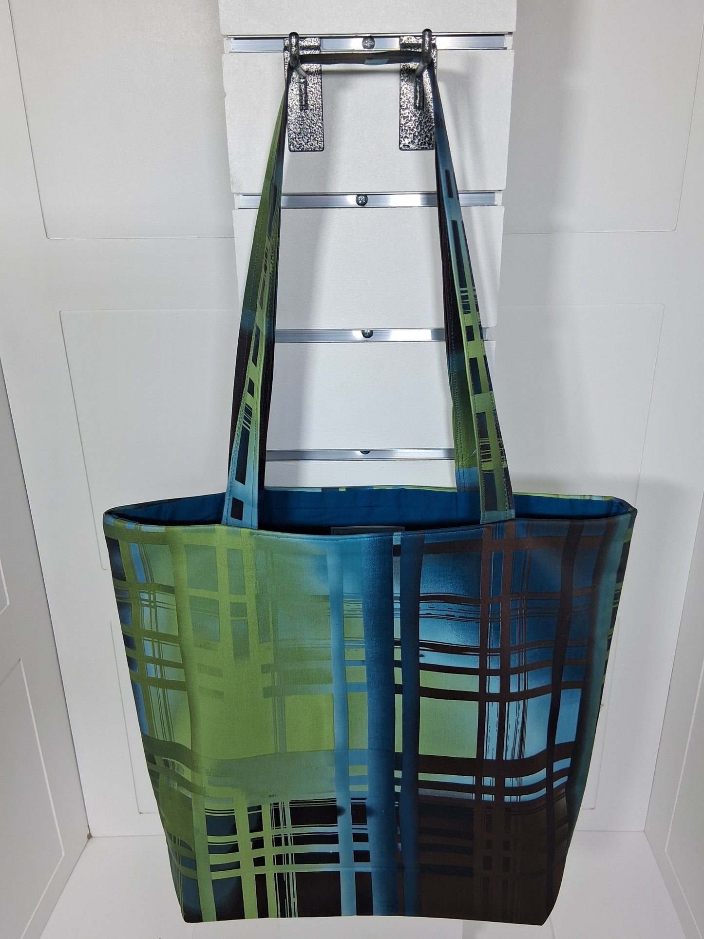 "Pinpins Designs handmade tote bag – front view, green blue and brown plaid grid fabric with teal lining"