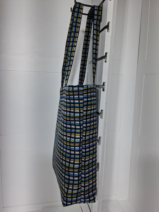 Pinpins Designs handmade tote bag- side view, blue and green geometric grid fabric with royal blue lining.