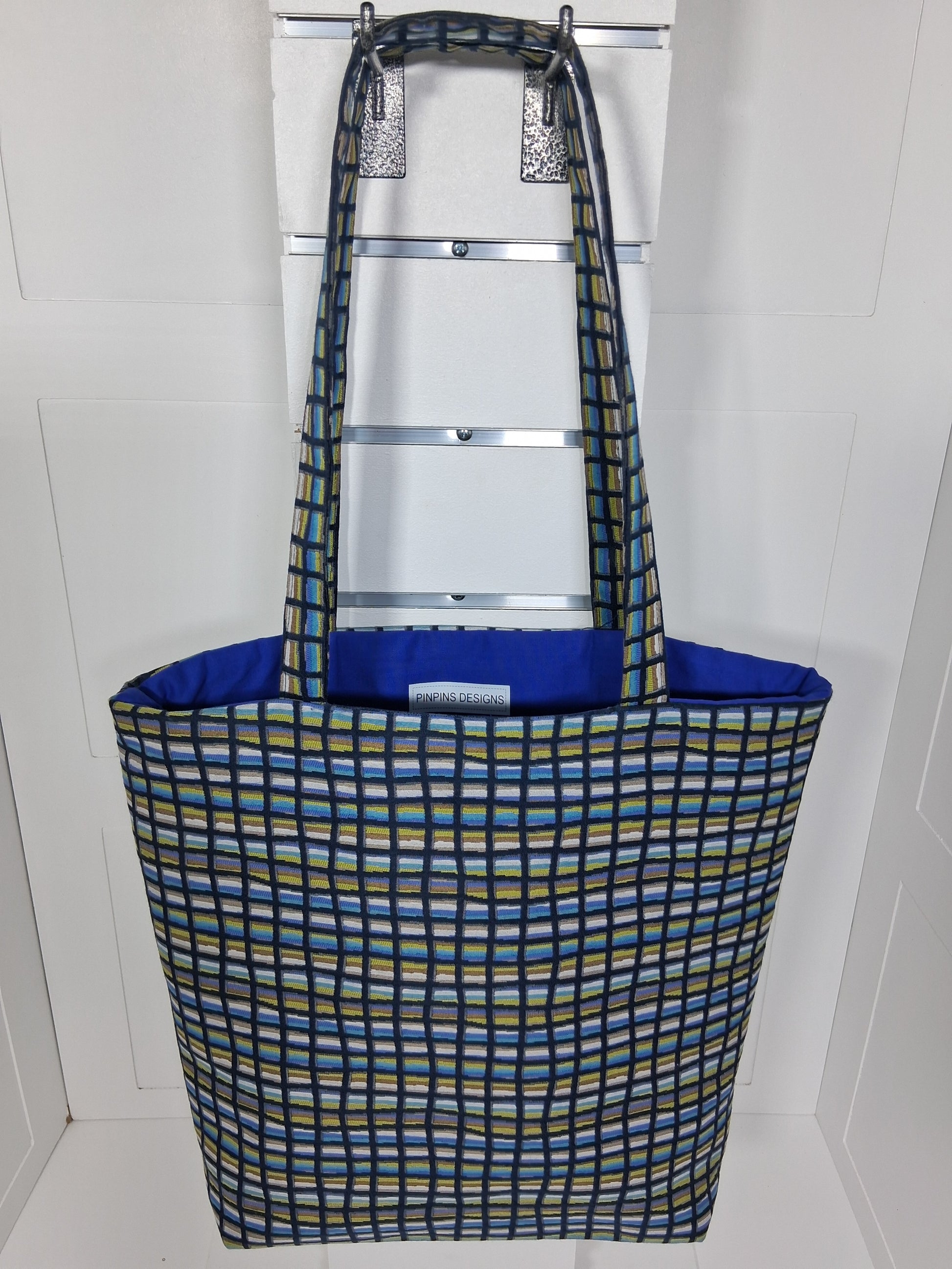  "Pinpins Designs handmade tote bag – front view, blue and green geometric grid fabric with royal blue lining"
